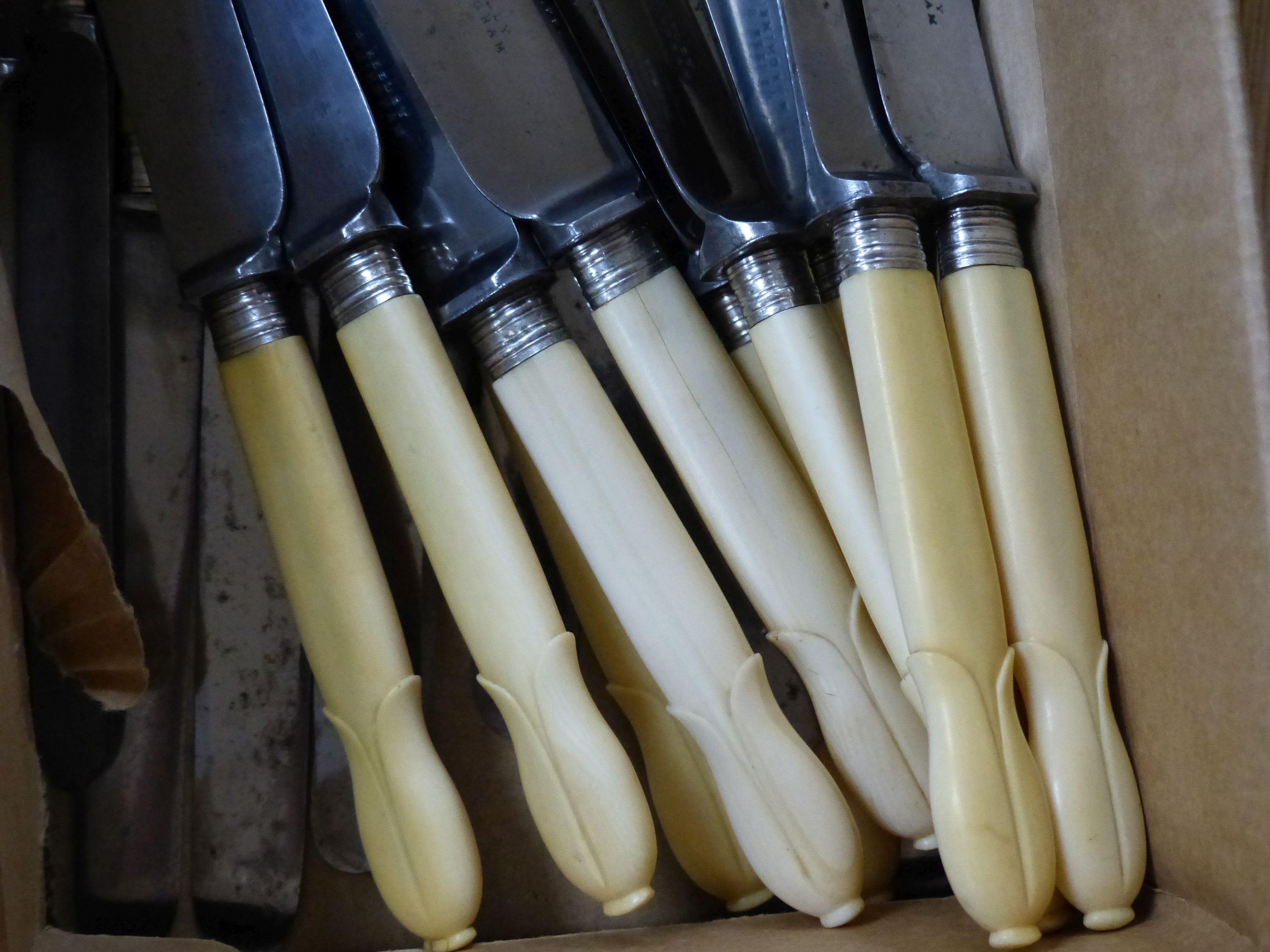 A set of 12 early 19th century ivory handle knives retailed by Samuel Keeley, Birmingham , 12 matching knives